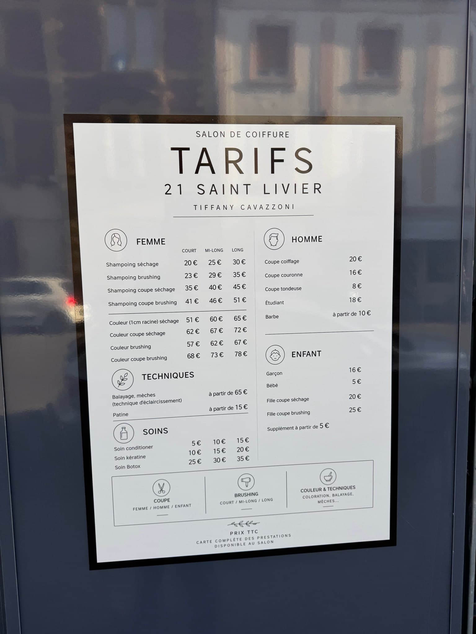 Grille des tarifs du salon de coiffure 21 Saint Livier, imprimée et affichée en vitrine